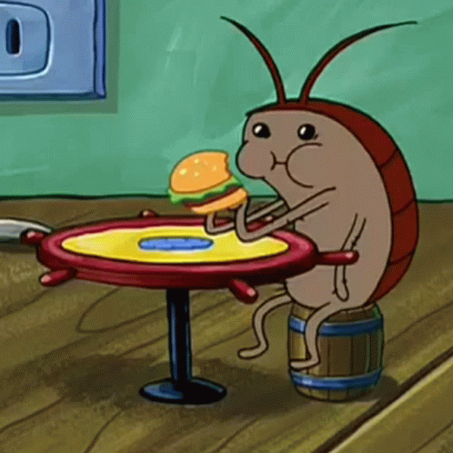 A Cartoon Cockroach Is Sitting At A Table With A Hamburger In Its Mouth . GIF