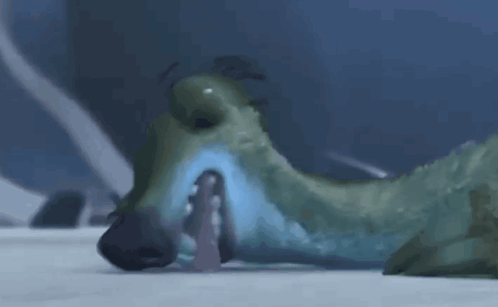A Cartoon Dinosaur Is Laying On The Ground With Its Mouth Open And A Person In The Background . GIF