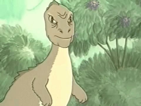 a cartoon dinosaur is standing in the grass with a serious look on its face .