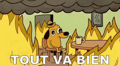 A Cartoon Dog Is Sitting At A Table With A Cup Of Coffee In Front Of A Burning House . GIF
