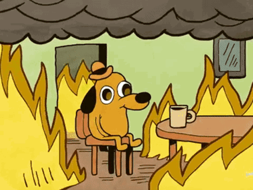 A Cartoon Dog Is Sitting At A Table With A Cup Of Coffee Surrounded By Fire . GIF