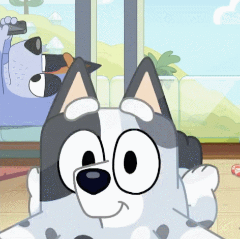 A Cartoon Dog Is Sitting On A Couch Looking At The Camera GIF