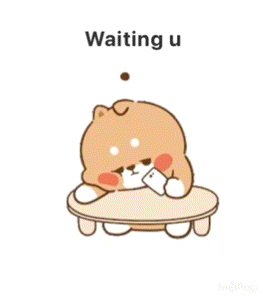 A Cartoon Dog Is Sitting On A Table Holding A Cell Phone And Waiting For Someone . GIF