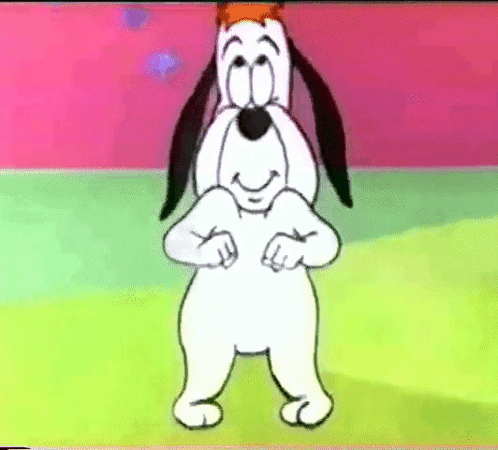 A Cartoon Dog With A Crown On His Head Is Standing On A Green Field And Smiling . GIF