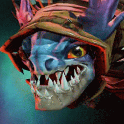 A Cartoon Drawing Of A Monster With Sharp Teeth And Red Eyes GIF
