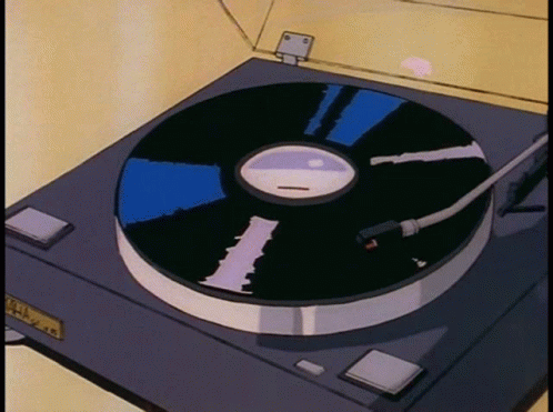 A Cartoon Drawing Of A Record Player With A Record On It GIF