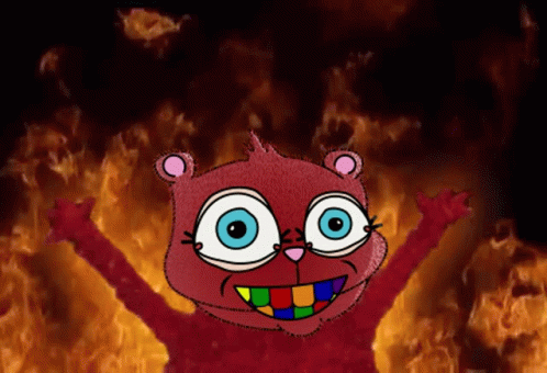 A Cartoon Drawing Of A Teddy Bear With Blue Eyes Standing In Front Of A Fire GIF