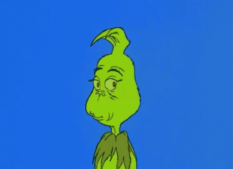 A Cartoon Drawing Of Grinch With A Very Angry Look On His Face GIF