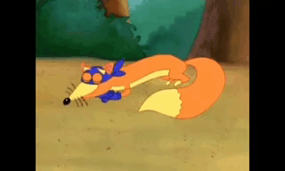 A Cartoon Fox Is Laying On The Ground With Its Tail Extended . GIF