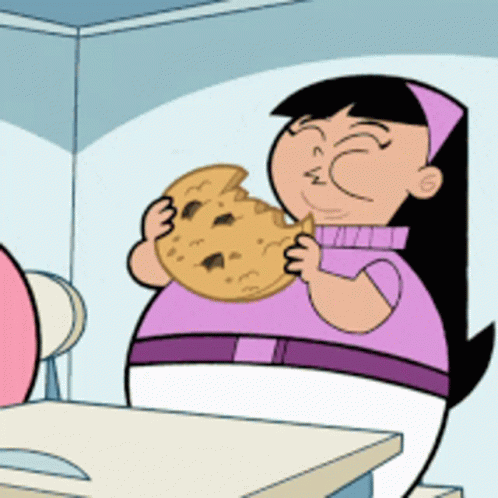 A Cartoon Girl Is Eating A Cookie With A Slice Missing GIF