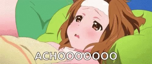 A Cartoon Girl Is Laying In Bed With A Bandage On Her Head And The Words Achoo Written On The Bottom . GIF