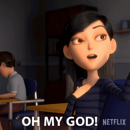 A Cartoon Girl Is Sitting At A Desk And Says " Oh My God " GIF