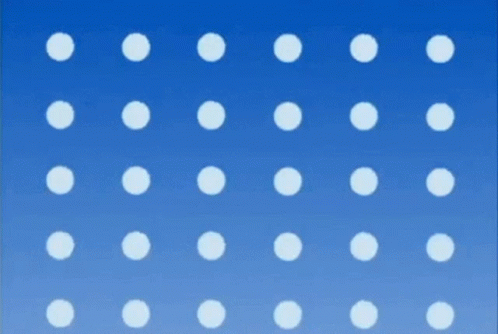 A Cartoon Girl Is Wearing A Blue Hat With White Polka Dots On It . GIF
