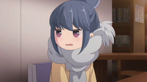 A Cartoon Girl With A Scarf Around Her Neck Is Sitting In Front Of A Bookshelf GIF
