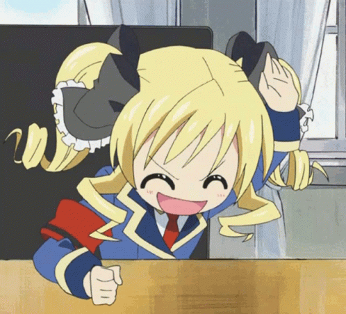 A Cartoon Girl With Blonde Hair Is Smiling And Making A Fist In The Air GIF
