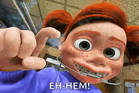 A Cartoon Girl With Braces On Her Teeth Is Pointing At The Camera . GIF