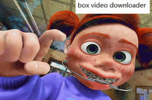 A Cartoon Girl With Freckles And Braces Is Pointing At The Camera With A Box Video Downloader Written Above Her GIF