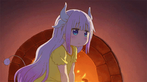 A Cartoon Girl With Horns And A Tail Is Standing In Front Of A Fireplace . GIF
