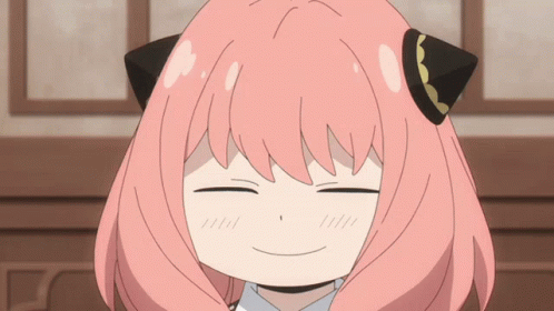 A Cartoon Girl With Pink Hair And Black Ears Is Smiling GIF