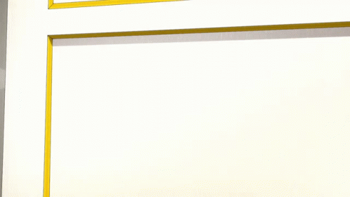 A Cartoon Girl With Pink Hair And Blue Eyes Is Making A Funny Face GIF