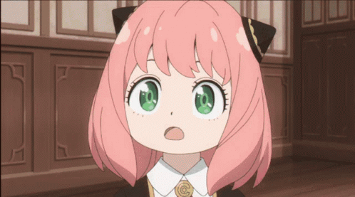 A Cartoon Girl With Pink Hair And Green Eyes Looks Surprised GIF