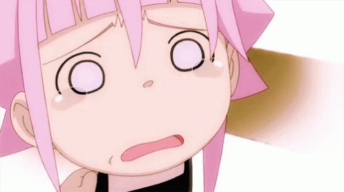 A Cartoon Girl With Pink Hair Is Crying And Making A Sad Face . GIF