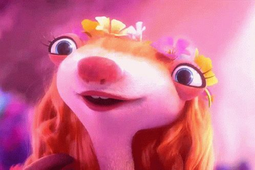 A Cartoon Hamster With Red Hair And Flowers On Her Head GIF