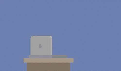 a cartoon illustration of a man wearing a mask using a laptop computer