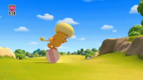 A Cartoon Lion Is Balancing On A Pink Ball GIF