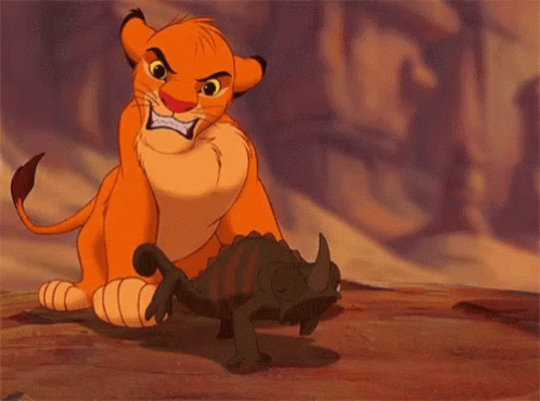 A Cartoon Lion Is Standing Next To A Lizard With Its Mouth Wide Open . GIF