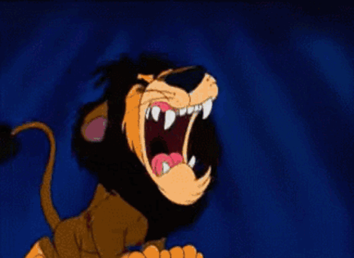 A Cartoon Lion With Its Mouth Open And Sharp Teeth GIF