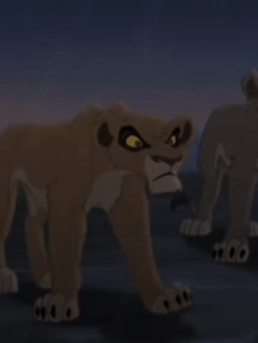 A Cartoon Lioness Is Standing In The Dark With A Serious Look On Her Face GIF