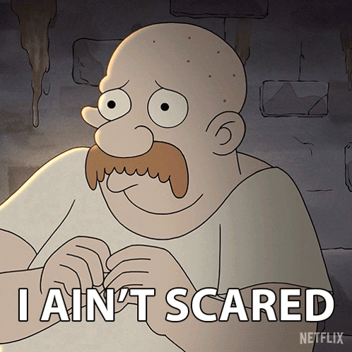 A Cartoon Man With A Mustache Says " I Ain T Scared " GIF