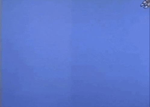 A Cartoon Mickey Mouse Is Flying Through The Air And Pointing Up GIF