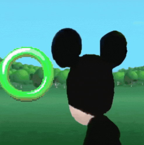 a cartoon mickey mouse is looking at a green circle