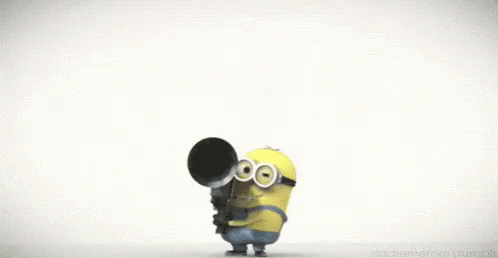 A Cartoon Minion Is Doing A Handstand With His Mouth Open And His Nose Sticking Out . GIF