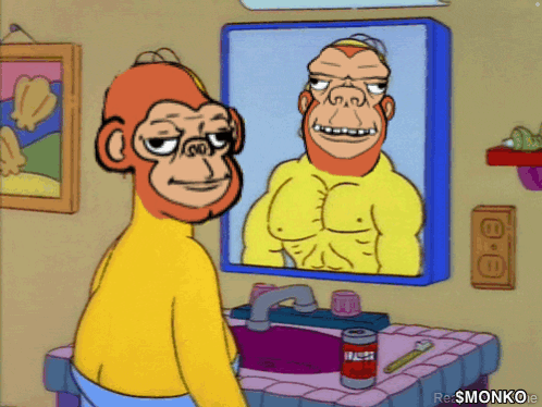 A Cartoon Monkey Looking At His Reflection In A Mirror GIF