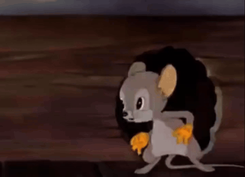 A Cartoon Mouse Is Running Through A Hole In A Wall And Eating A Piece Of Cheese . GIF