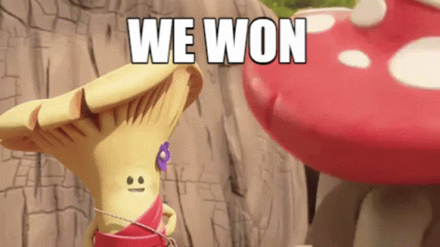 a cartoon mushroom with a face and the words we won written on it