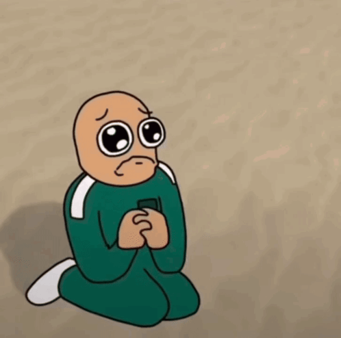 A Cartoon Of A Baby In A Green Jumpsuit With A Surprised Look On His Face GIF