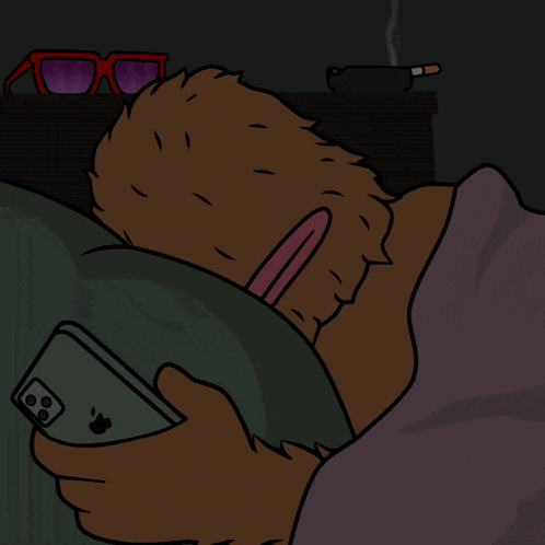 A Cartoon Of A Bear Laying In Bed Holding An Apple Iphone GIF