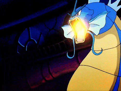 A Cartoon Of A Blue And Yellow Monster With Its Mouth Open GIF