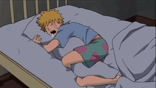 A Cartoon Of A Boy Sleeping On A Bed With His Mouth Open GIF