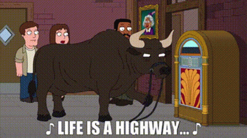 A Cartoon Of A Bull Standing Next To A Jukebox With The Words Life Is A Highway Below It GIF