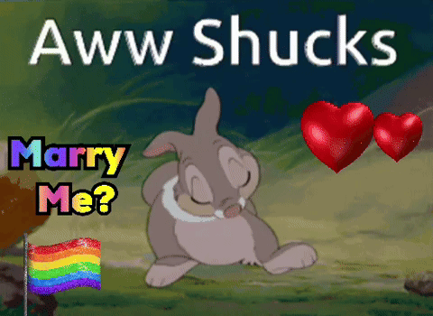 a cartoon of a bunny with the words marry me