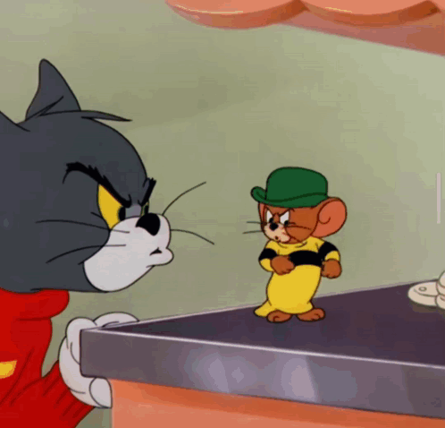 A Cartoon Of A Cat And A Mouse Standing Next To Each Other GIF