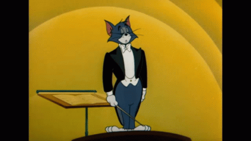 A Cartoon Of A Cat In A Tuxedo Holding A Conductor 'S Stick GIF