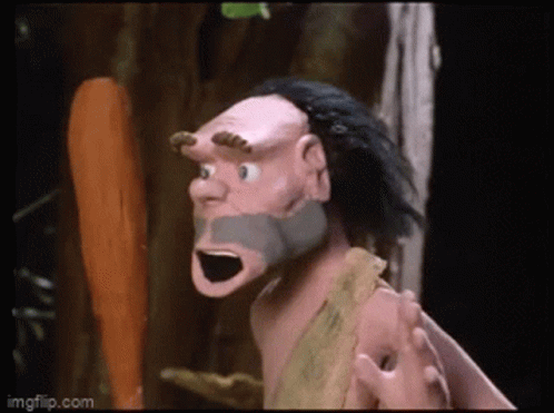 A Cartoon Of A Caveman With A Beard And Horns GIF