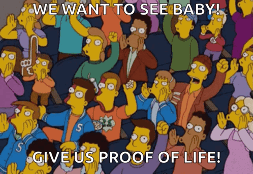 A Cartoon Of A Crowd With The Words We Want To See Baby GIF