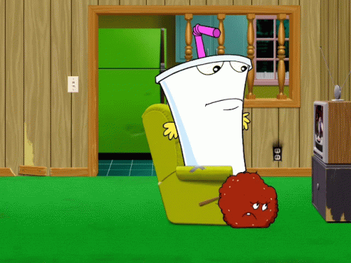 A Cartoon Of A Cup With A Straw Sitting On A Chair GIF